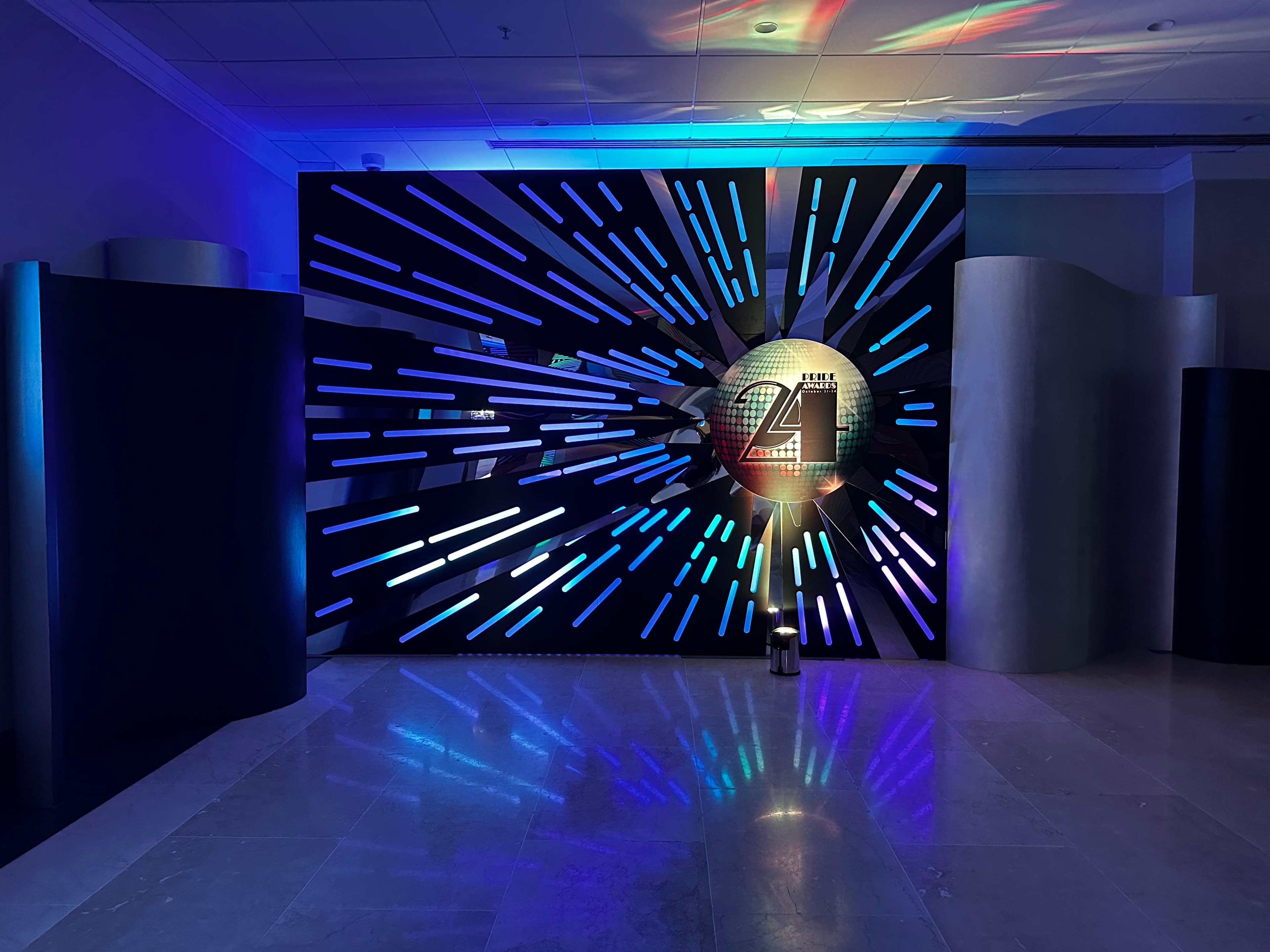 A live event space lit in blue by Primo specialists